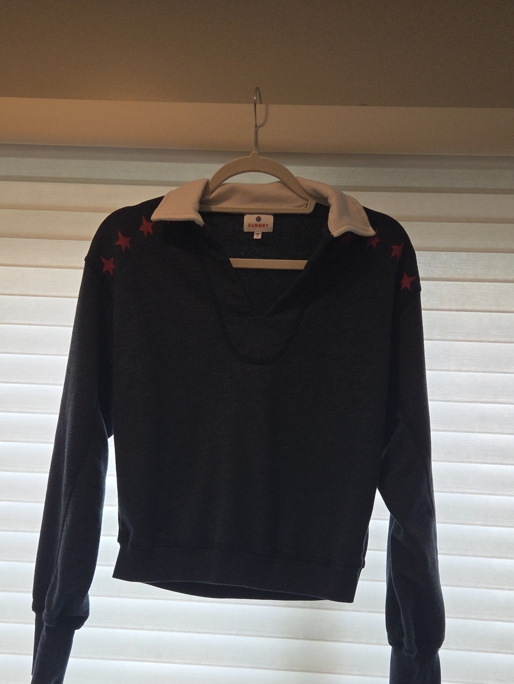 Sundry Navy V-Neck Sweater with Cream Collar and Red Star Accents